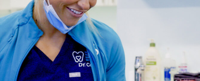 Dr. Cook, Orthodontist in Richmond, VA, smiling warmly with a young patient at Richmond Pediatric Dentistry & Orthodontics