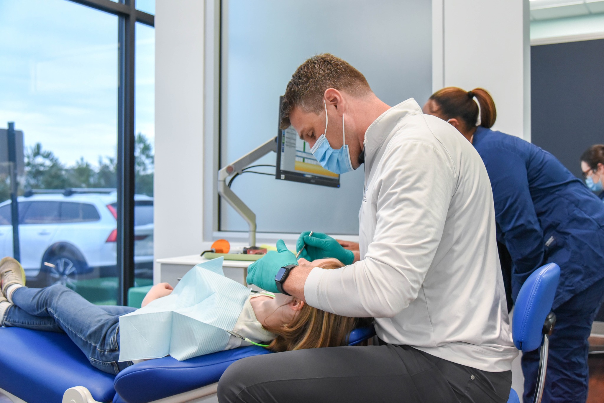 Airway Orthodontics in Richmond, VA for Breathing, Sleep & Jaw Development 2 Orthodontist performing an airway orthodontic evaluation on a young patient at Richmond Pediatric Dentistry and Orthodontics in Richmond, VA