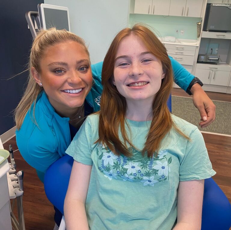 Dr. Cook with a patient at a Richmond orthodontic office