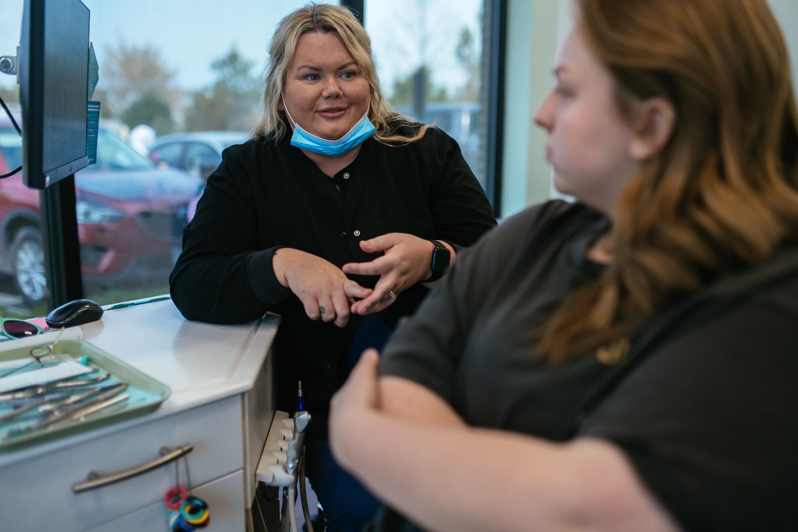 Palatal Expander in Richmond, VA for Kids, Teens, and Adults 8 Adult patient talking with an RPDO orthodontic team member about treatment options