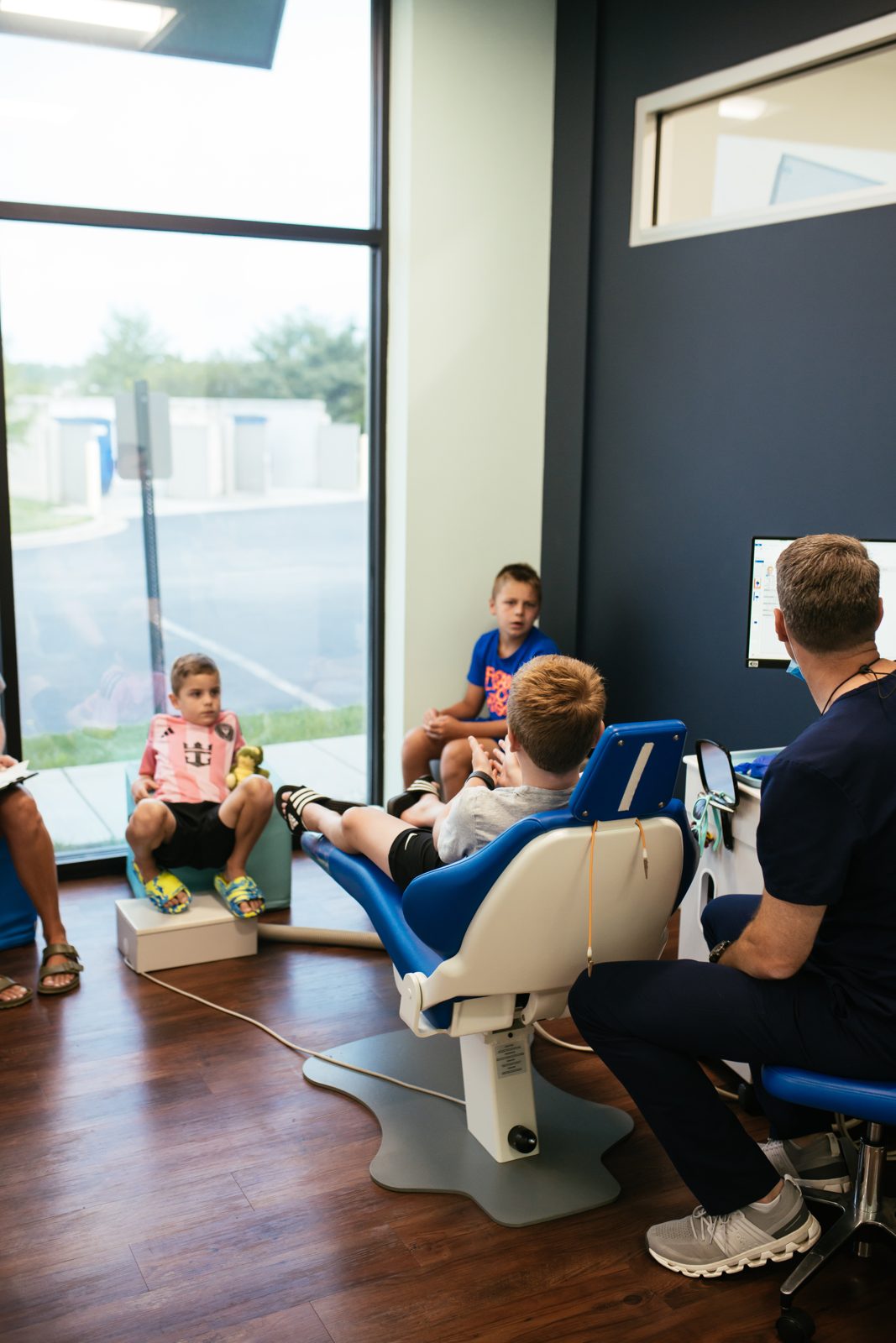 Teeth Cleaning for Kids in Richmond, VA 10 Kids relaxing in the RPDO waiting area, where pediatric dentistry and orthodontics share one practice in Richmond, VA