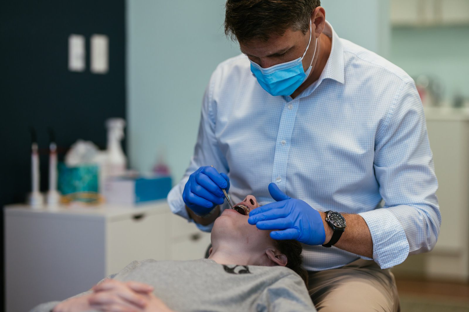 Palatal Expander in Richmond, VA for Kids, Teens, and Adults 4 Dr. Kevin Bibona checking a patient's bite and upper jaw width at RPDO in Richmond, VA